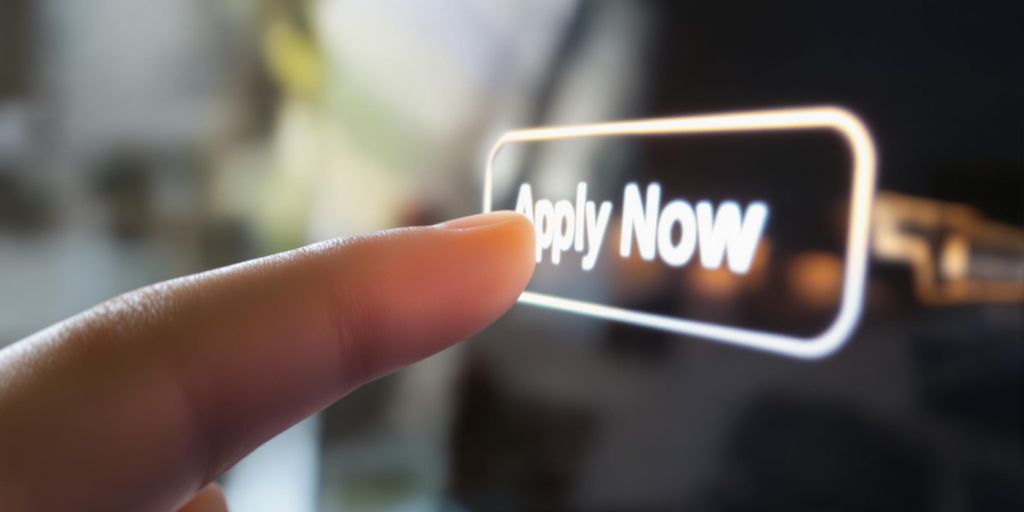 Finger clicking button on screen, job applications.